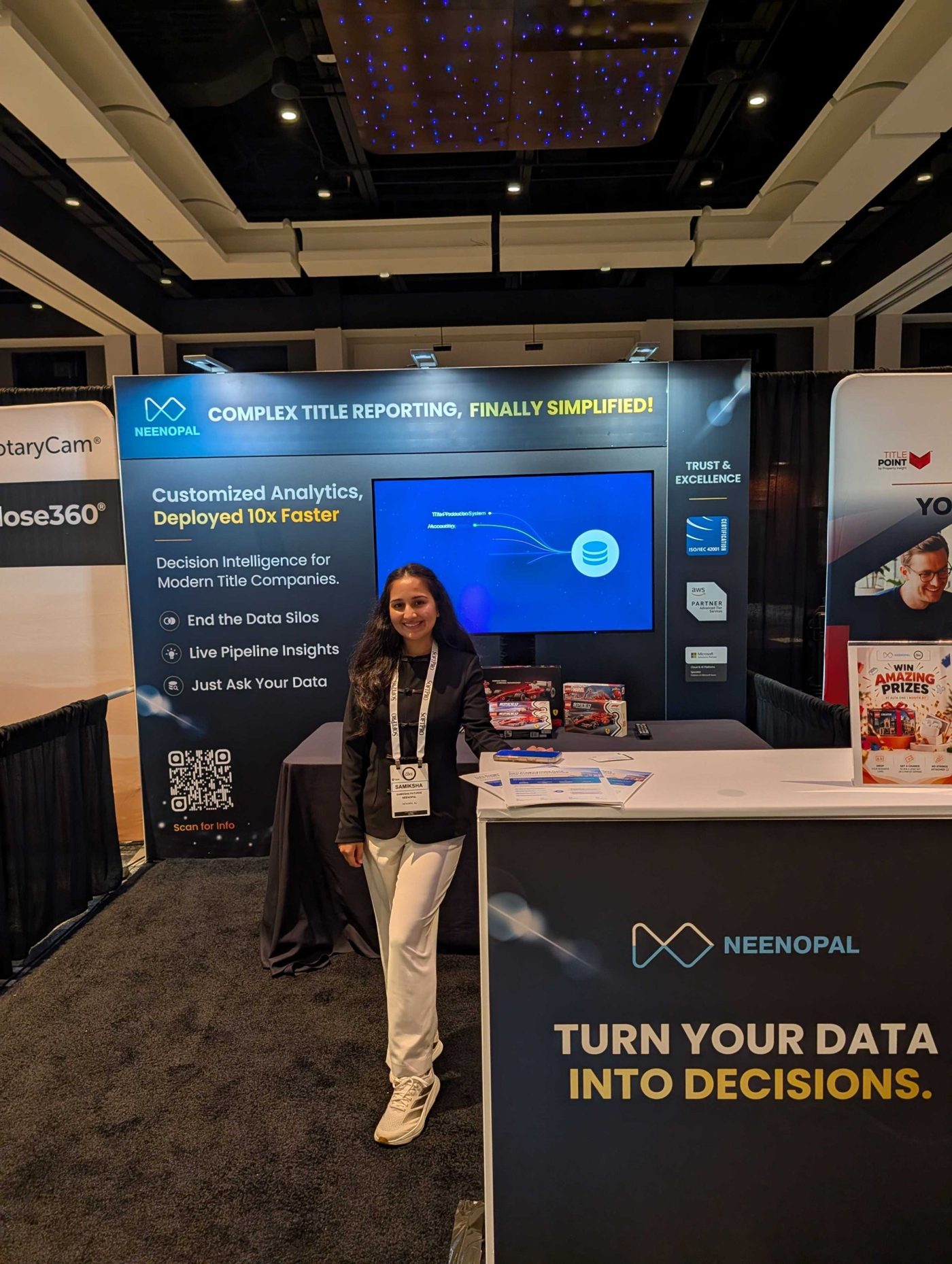 A NeenOpal team member at the booth